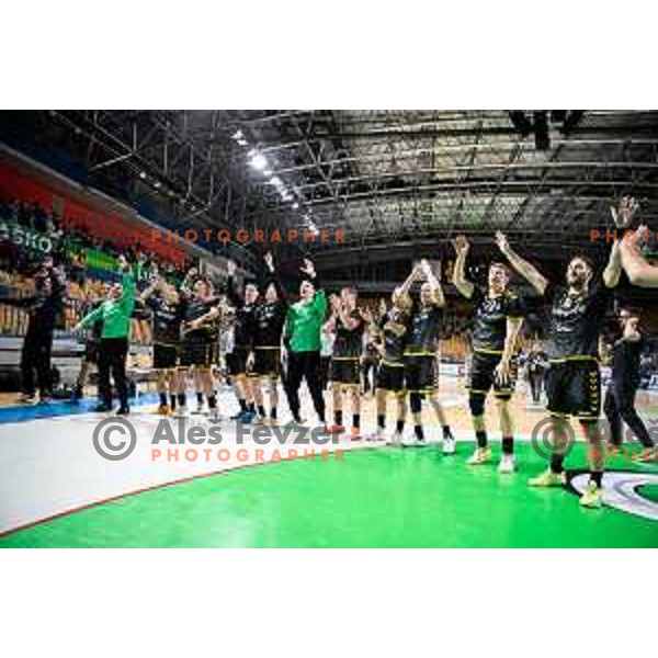 Players of Gorenje Velenje celebrate a victory in the third match of the semi-final of 1.NLB league handball match between Celje Pivovarna Lasko and Gorenje Velenje in Celje, Slovenia on May 24, 2025