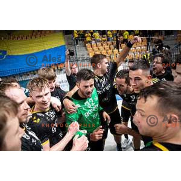Players of Gorenje Velenje celebrate a victory in the third match of the semi-final of 1.NLB league handball match between Celje Pivovarna Lasko and Gorenje Velenje in Celje, Slovenia on May 24, 2025