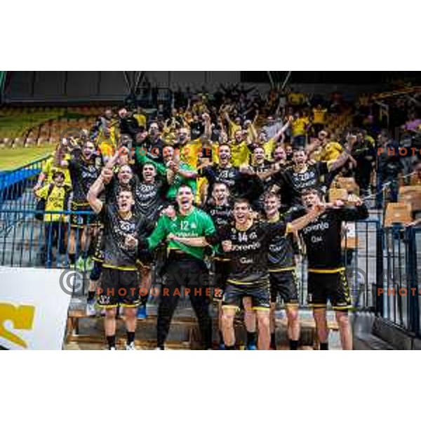 Players of Gorenje Velenje celebrate a victory in the third match of the semi-final of 1.NLB league handball match between Celje Pivovarna Lasko and Gorenje Velenje in Celje, Slovenia on May 24, 2025