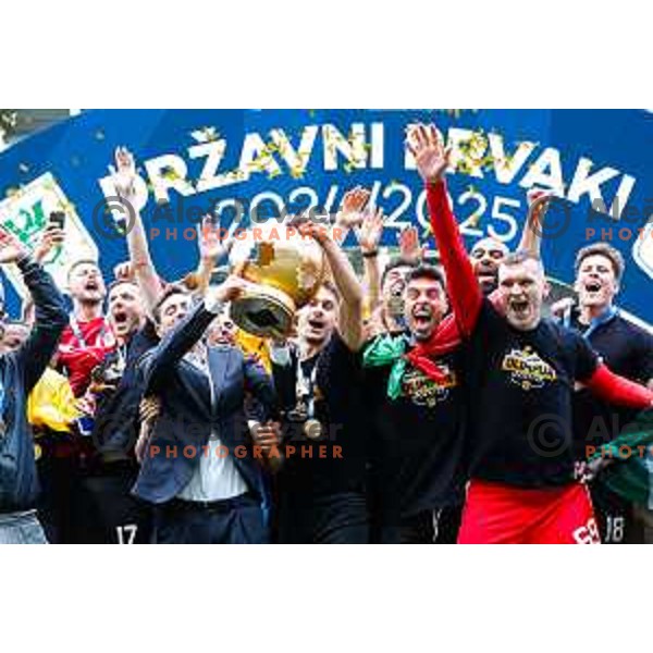 Head coach Victor Sanchez, Marcel Ratnik, Matevz Vidovsek and players of Olimpija celebrate Slovenian National Title after the Prva liga Telemach 2024/2025 football match between Bravo and Olimpija in Ljubljana, Slovenia on May 24, 2025