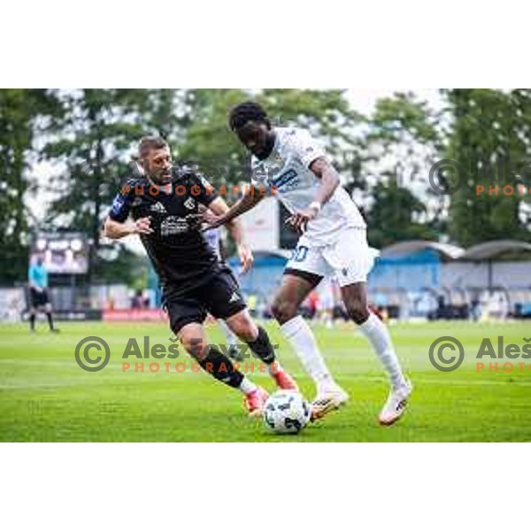 Amadej Marosa vs Jean-Pierre Longonda Itamba Mboyo in action during Prva liga Telemach football match between Mura and Koper in Fazanerija, Murska Sobota, Slovenia on May 25, 2025. Photo: Jure Banfi