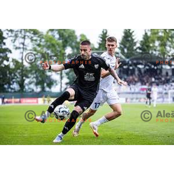 Dario Vizinger vs Petar Petrisko in action during Prva liga Telemach football match between Mura and Koper in Fazanerija, Murska Sobota, Slovenia on May 25, 2025. Photo: Jure Banfi