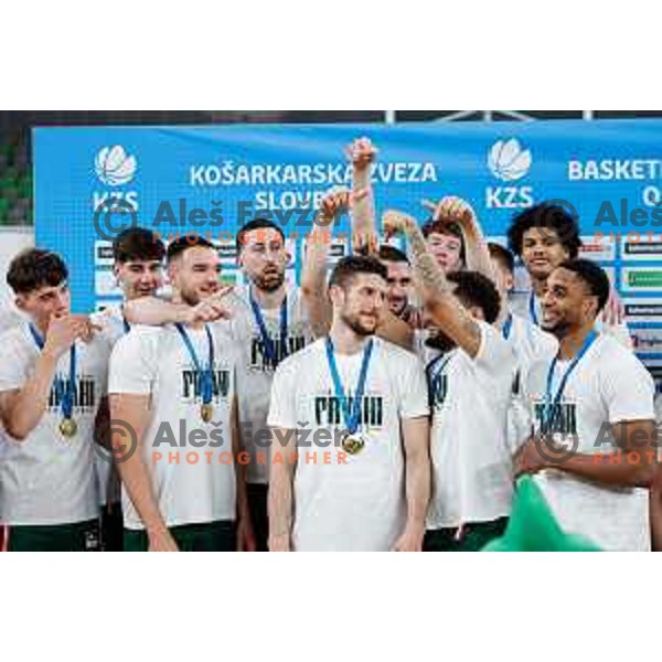 MVP of the Finals Aleksej Nikolic and players celebrate Slovenian National Title after victory in the fourth match of the Finals of OTP Bank League 2024/2025 between Cedevita Olimpija and Krka in SRC Stozice, Ljubljana, Slovenia on June 9, 2025.