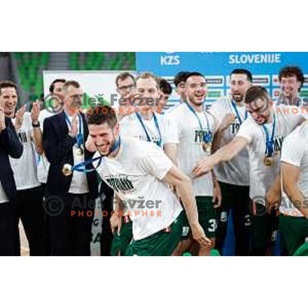 MVP of the Finals Aleksej Nikolic and players celebrate Slovenian National Title after victory in the fourth match of the Finals of OTP Bank League 2024/2025 between Cedevita Olimpija and Krka in SRC Stozice, Ljubljana, Slovenia on June 9, 2025.