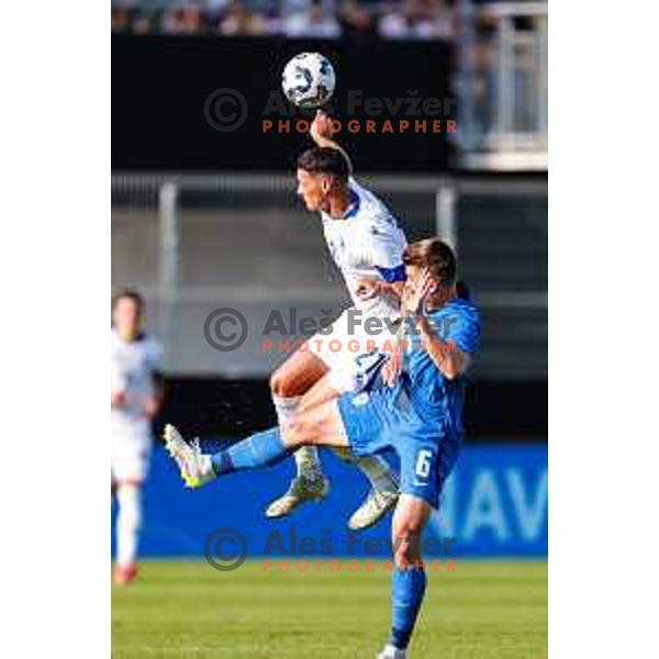 Luka Kulenovic and Jaka Bijol in action during international friendly football match between Slovenia and Bosnia and Herzegovina in Celje, Slovenia on June 10, 2025.