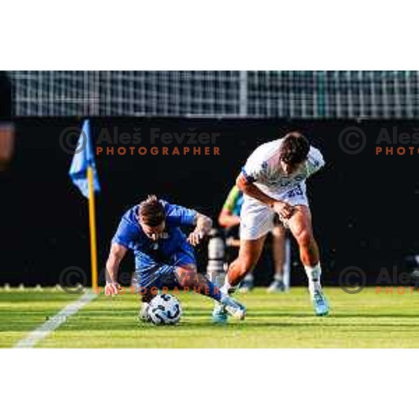 Benjamin Verbic and Arjan Malic in action during international friendly football match between Slovenia and Bosnia and Herzegovina in Celje, Slovenia on June 10, 2025.