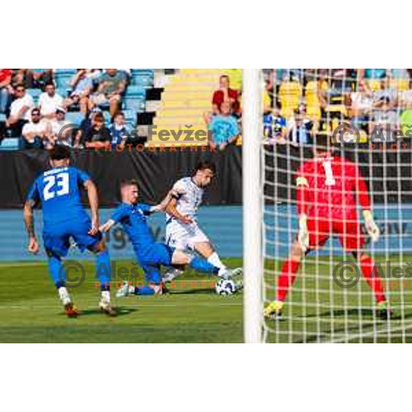 Zan Karnicnik and Amar Dedic in action during international friendly football match between Slovenia and Bosnia and Herzegovina in Celje, Slovenia on June 10, 2025.