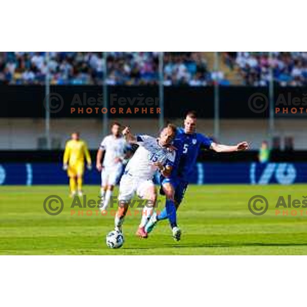 Amar Memic and Mark Zabukovnik in action during international friendly football match between Slovenia and Bosnia and Herzegovina in Celje, Slovenia on June 10, 2025.