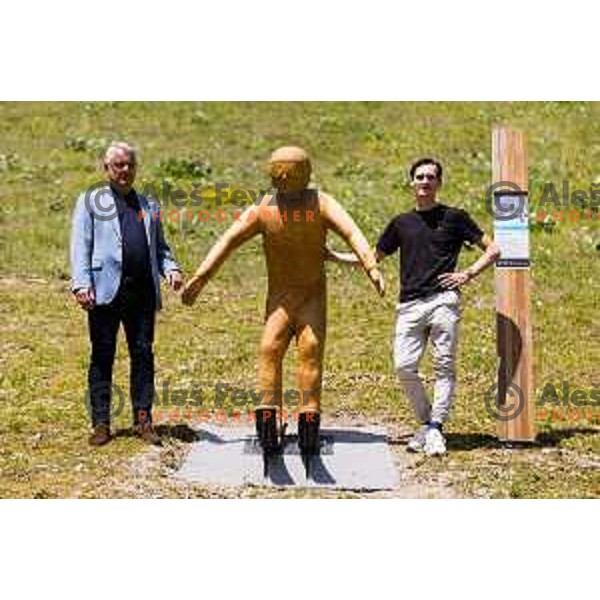 Matjaz Han and Domen Prevc posing with statue during ceremonial event for reveiling of the statue of Domen Prevc for World Record holder in Ski Jumping in NC Planica, Slovenia on June 18, 2025. Photo Grega Valancic