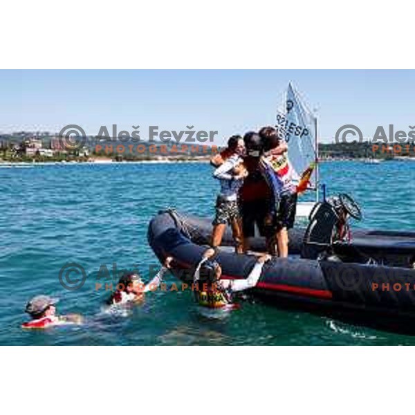 Members of Team Spain and their fans celebrate the victory in the Team Race Final sailing competition at 2025 Optimist World Championship in Portoroz, Slovenia on July 2, 2025