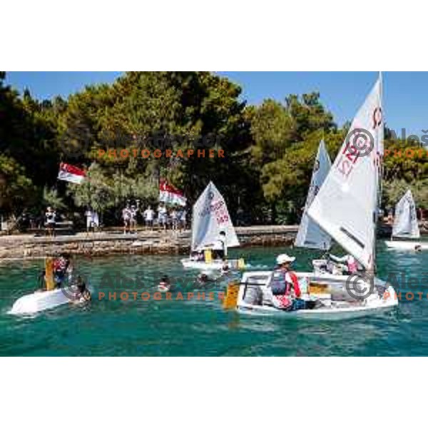 Members of Team Singapore celebrate silver medal in the Team Race Final sailing competition at 2025 Optimist World Championship in Portoroz, Slovenia on July 2, 2025