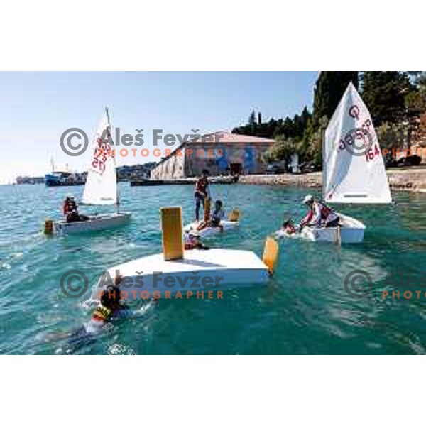 Members of Team Singapore celebrate silver medal in the Team Race Final sailing competition at 2025 Optimist World Championship in Portoroz, Slovenia on July 2, 2025