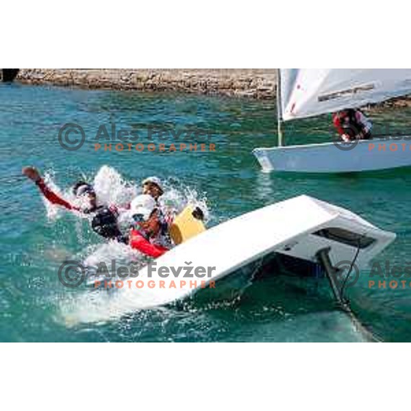 Members of Team Singapore celebrate silver medal in the Team Race Final sailing competition at 2025 Optimist World Championship in Portoroz, Slovenia on July 2, 2025