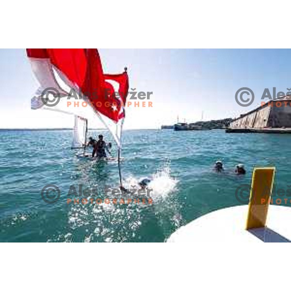 Members of Team Singapore celebrate silver medal in the Team Race Final sailing competition at 2025 Optimist World Championship in Portoroz, Slovenia on July 2, 2025