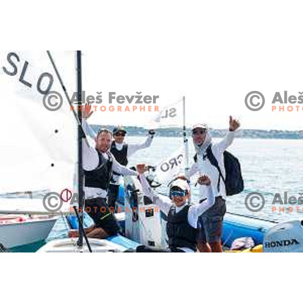 Mihael Zobec (SLO) celebrate silver medal with friends after Final day of sailing competition at 2025 Optimist World Championship in Portoroz, Slovenia on July 5, 2025