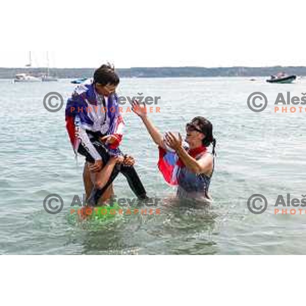 Mihael Zobec (SLO) celebrate silver medal with friends after Final day of sailing competition at 2025 Optimist World Championship in Portoroz, Slovenia on July 5, 2025