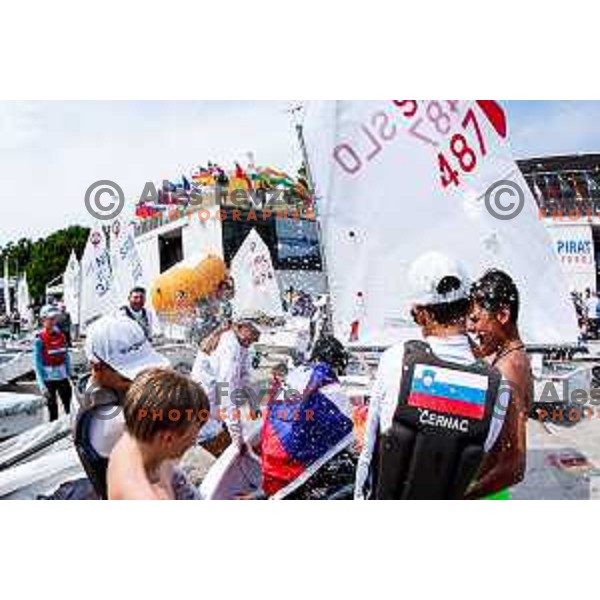Mihael Zobec (SLO) celebrate silver medal with friends after Final day of sailing competition at 2025 Optimist World Championship in Portoroz, Slovenia on July 5, 2025