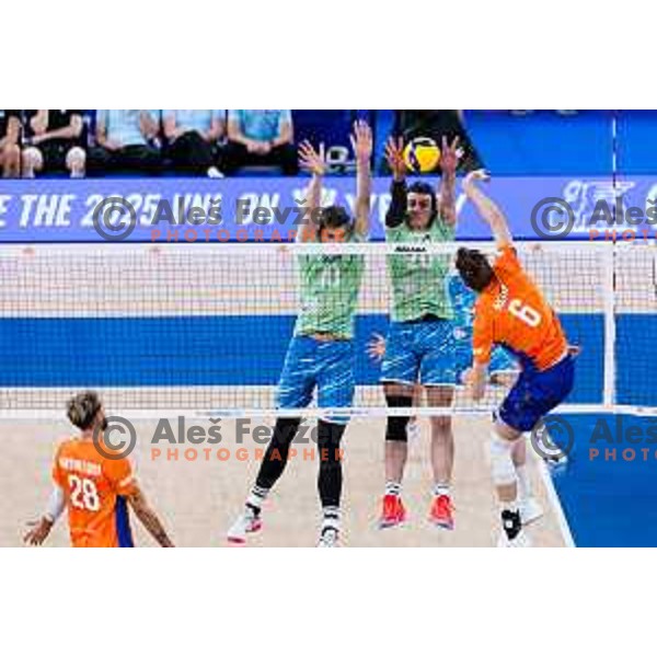 Saso Stalekar of Slovenia and Nik Mujanovic of Slovenia in action during Men’s Volleyball Nations League match between Slovenia and Canada in Ljubljana, Slovenia on July 17, 2025. Photo Grega Valancic