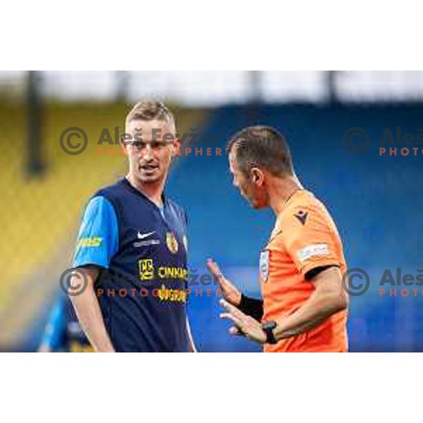 Zan Karnicnik and referee Dragomir Draganov in action during UEFA Europa League 2025/26 qualifier football match between NK Celje and Sabah FC in Stadion z’dezele, Celje, Slovenia on July 17, 2025. Photo: Jure Banfi
