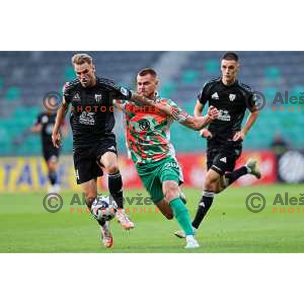 Raphael Hofer of Mura and Alex Matthias Tamm of Olimpija in action during Prva liga Telemach 2025/2026 football match between Olimpija and Mura in SRC Stozice, Ljubljana, Slovenia on July 19, 2025. Photo: Filip Barbalic
