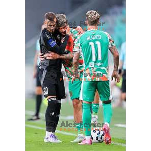 Almin Kurtovic of Mura and Agustin Doffo of Olimpija in action during Prva liga Telemach 2025/2026 football match between Olimpija and Mura in SRC Stozice, Ljubljana, Slovenia on July 19, 2025. Photo: Filip Barbalic