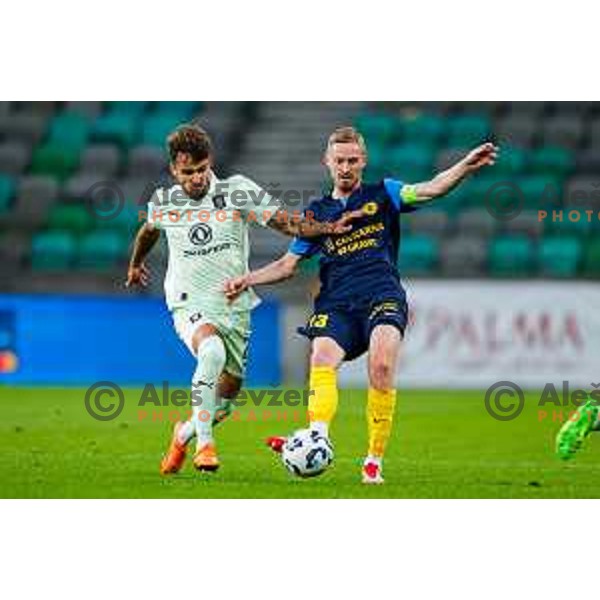 Diogo Pinto and Zan Karnicnik in action during Prva liga Telemach 2025/2026 football match between Olimpija and Celje in SRC Stozice, Ljubljana, Slovenia on August 3, 2025