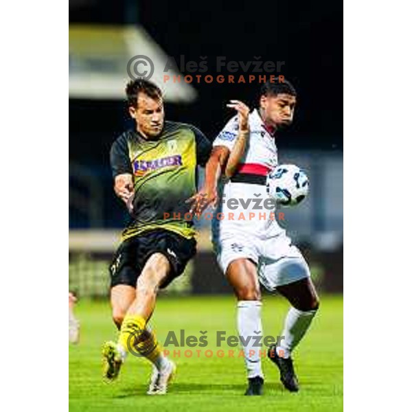 Ivan Calusic and Roger Andretty Murillo Soto in action during Prva liga Telemach 2025/2026 football match between Kalcer Radomlje and Primorje in Domzale, Slovenia on August 15, 2025