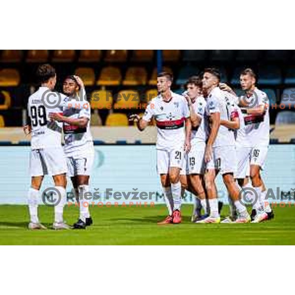 Matic Zavnik and players of Primorje celebrate a goal during Prva liga Telemach 2025/2026 football match between Kalcer Radomlje and Primorje in Domzale, Slovenia on August 15, 2025