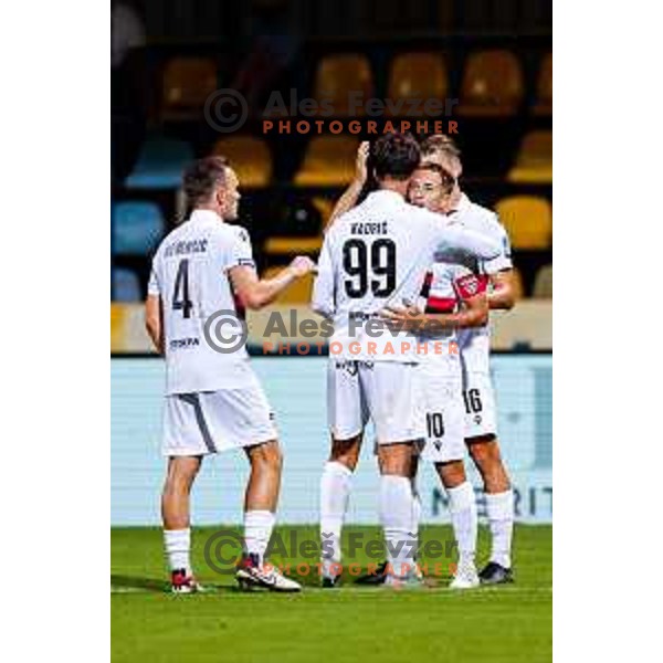 Matic Zavnik and players of Primorje celebrate a goal during Prva liga Telemach 2025/2026 football match between Kalcer Radomlje and Primorje in Domzale, Slovenia on August 15, 2025
