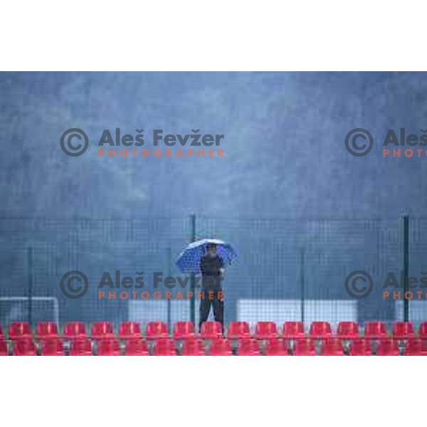 Spectator in the rain during Prva liga Telemach 2025/26 football match between NK Aluminij and NK Koper in Sportni park Kidricevo, Slovenia on August 29, 2025. Photo: Jure Banfi