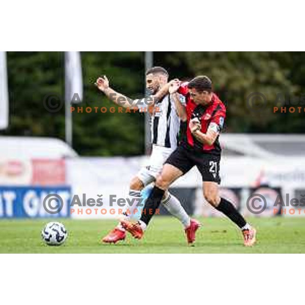 Nino Kouter vs Nik Jermol in action during Prva liga Telemach 2025/26 football match between Mura and Primorje in Fazanerija, Murska Sobota, Slovenia on August 31, 2025. Photo: Jure Banfi