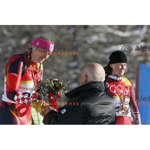 Kostelic Janica receives flowers from Kocjancic Janez