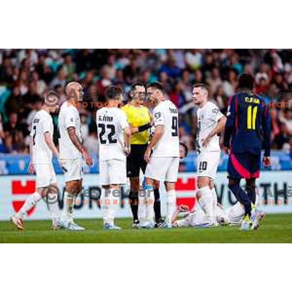 Vanja Drkusic, referee Jose Maria Sanchez, Andraz Sporar and Timi Max Elsnik during FIFA World Cup 2026 Qualifying round match between Slovenia and Sweden at Stadium Stozice, Ljubljana, Slovenia on September 5, 2025