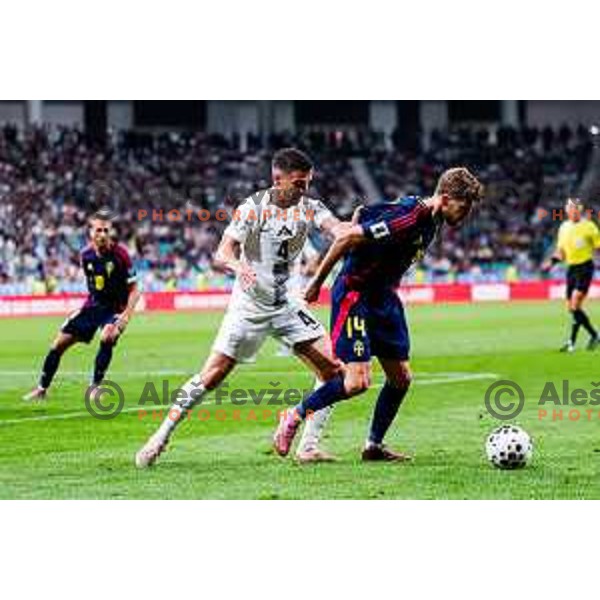 Dejan Petrovic and Anton Saletros in action during FIFA World Cup 2026 Qualifying round match between Slovenia and Sweden at Stadium Stozice, Ljubljana, Slovenia on September 5, 2025