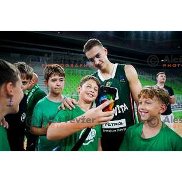 Miha Cerkvenik of Cedevita Olimpija with fans after preseason friendly match between Cedevita Olimpija and Cedevita Zagreb in Ljubljana, Slovenia on September 12, 2025. Photo: Filip Barbalic