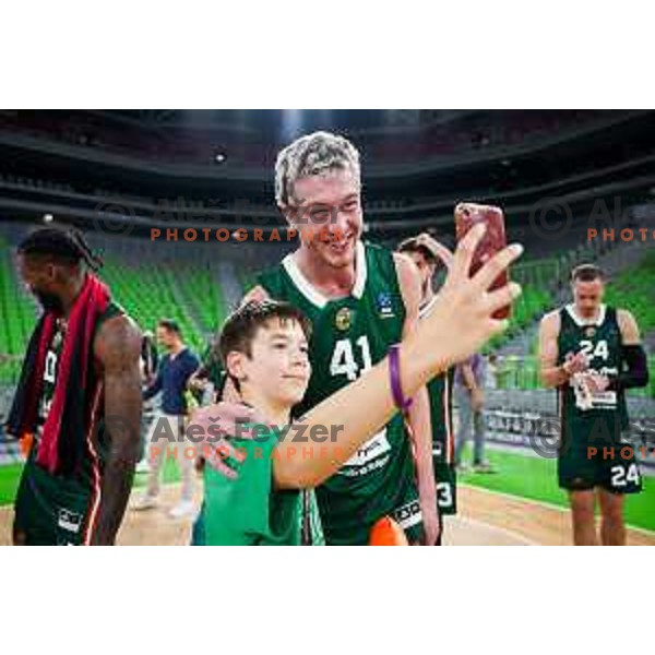 Ziga Daneu of Cedevita Olimpija with fans after preseason friendly match between Cedevita Olimpija and Cedevita Zagreb in Ljubljana, Slovenia on September 12, 2025. Photo: Filip Barbalic