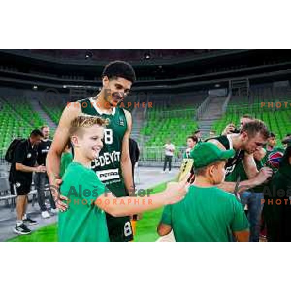 Cameron Houindo of Cedevita Olimpija with fans after preseason friendly match between Cedevita Olimpija and Cedevita Zagreb in Ljubljana, Slovenia on September 12, 2025. Photo: Filip Barbalic