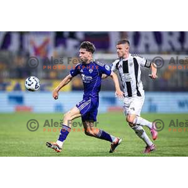Nejc Viher vs Luka Bobicanec in action during Prva liga Telemach 2025/26 football match between NK Maribor and NK Mura in Ljudski vrt, Maribor, Slovenia on September 13, 2025. Photo: Jure Banfi