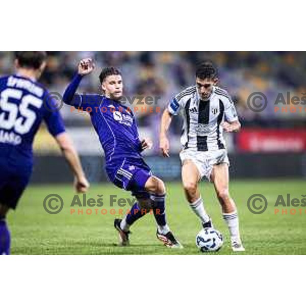 Omar Rekik vs Alen Korosec in action during Prva liga Telemach 2025/26 football match between NK Maribor and NK Mura in Ljudski vrt, Maribor, Slovenia on September 13, 2025. Photo: Jure Banfi