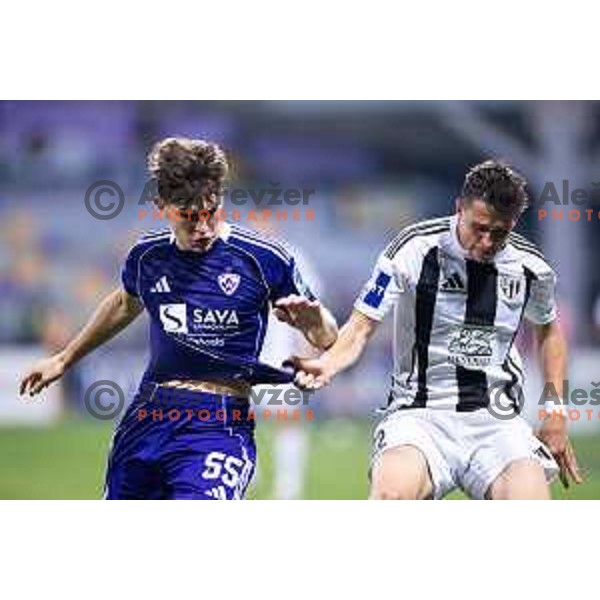 Mark Spanring vs Nejc Ajhmajer in action during Prva liga Telemach 2025/26 football match between NK Maribor and NK Mura in Ljudski vrt, Maribor, Slovenia on September 13, 2025. Photo: Jure Banfi