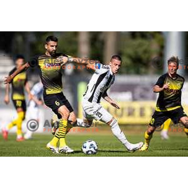 Ognjen Gnjatic vs Dario Vizinger in action during Prva liga Telemach 2025/26 football match between NK Mura and NK Kalcer Radomlje in Fazanerija, Murska Sobota, Slovenia on September 21, 2025. Photo: Jure Banfi