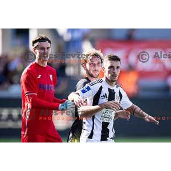 Samo Pridigar and Jasa Martincic vs Alen Korosec in action during Prva liga Telemach 2025/26 football match between NK Mura and NK Kalcer Radomlje in Fazanerija, Murska Sobota, Slovenia on September 21, 2025. Photo: Jure Banfi