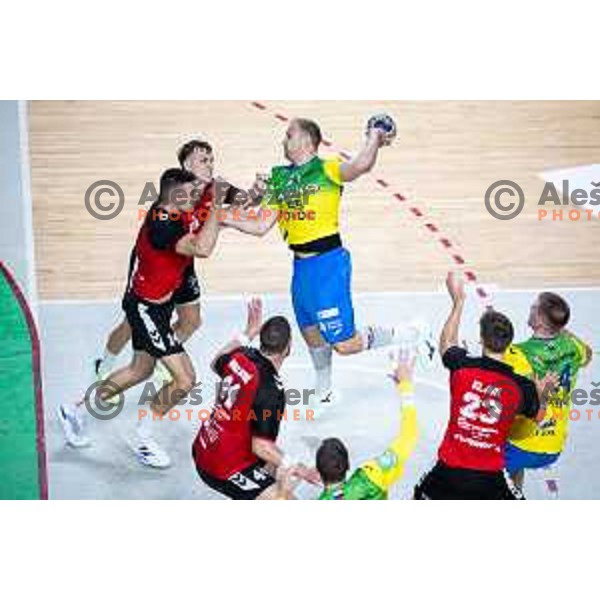 Leon Ljevar vs Ziga Mlakar in action during 1.NLB handball match between RK Celje Pivovarna Lasko and LL Grosist Slovan in Dvorana Zlatorog, Celje, Slovenia on September 26, 2025. Photo: Jure Banfi