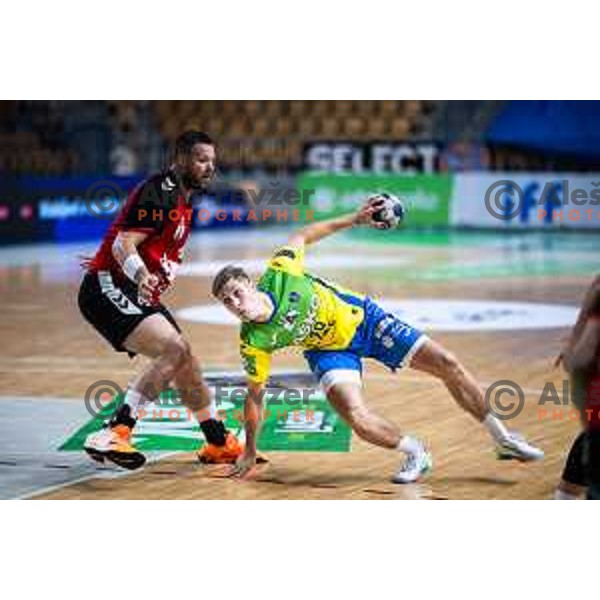 Ilija Brozovic vs Mai Marguc in action during 1.NLB handball match between RK Celje Pivovarna Lasko and LL Grosist Slovan in Dvorana Zlatorog, Celje, Slovenia on September 26, 2025. Photo: Jure Banfi