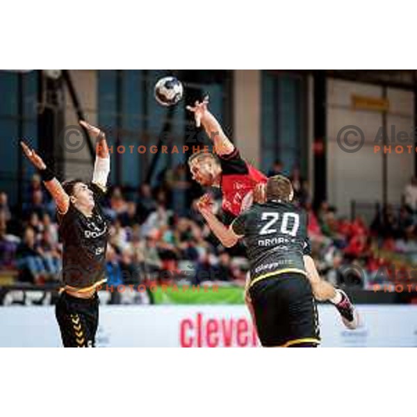 Gasper Hrastnik of RD LL Grosist Slovan in action during 1.NLB handball match between LL Grosist Slovan and RK Gorenje Velenje in Kodeljevo Hall, Ljubljana, Slovenia on October 1st, 2025.