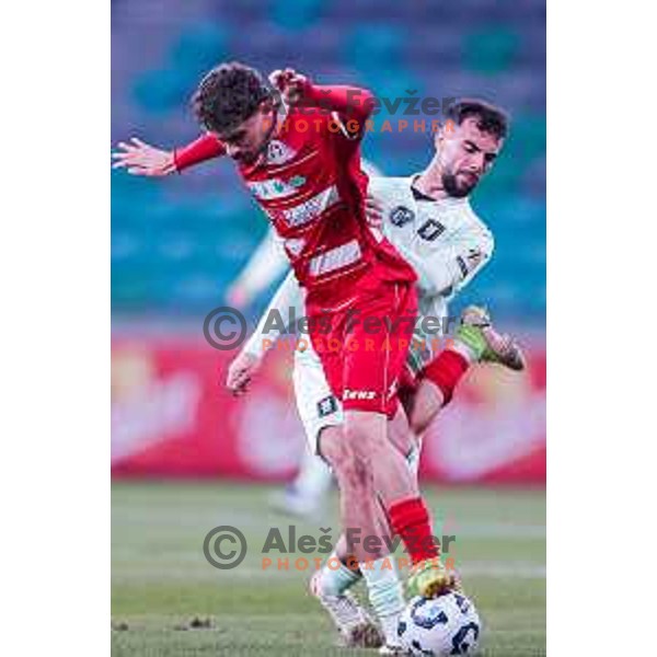 Jurgen Celhaka and Emir Saitoski in action during Prva liga Telemach 2025/2026 football match between Olimpija and Aluminij in SRC Stozice, Ljubljana, Slovenia on October 3, 2025