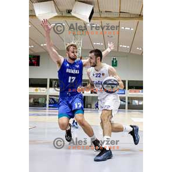 David Krizanic and Erolt Rrahmani in action during OTP Bank League 2025/2026 basketball match between Lasko and Rogaska in Tri Lilije Hall, Lasko, Slovenia on October 4, 2025
