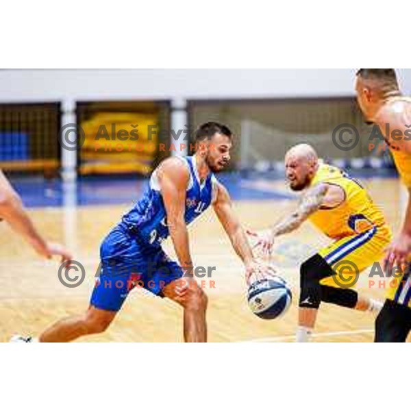 Nal Belko and Miha Vasl in action during OTP Bank League 2025/2026 basketball match between Hopsi Polzela and Sentjur in Polzela, Slovenia on October 4, 2025