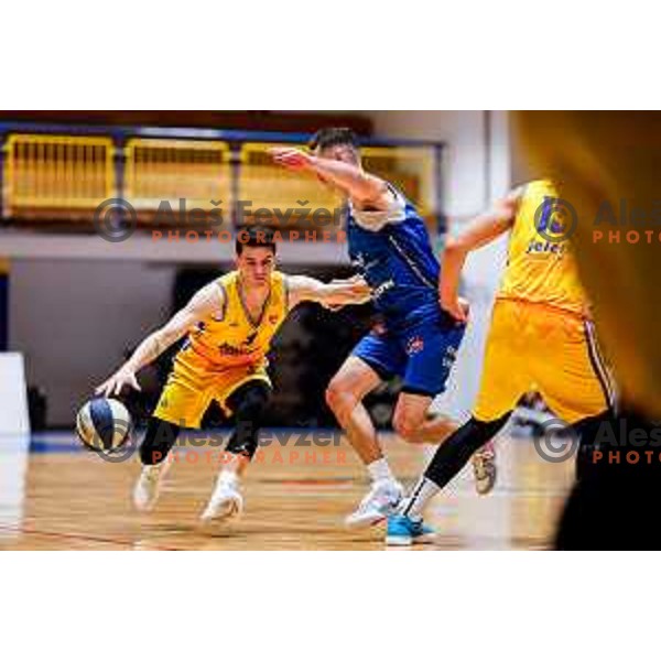 Nejc Baric and Jure Span in action during OTP Bank League 2025/2026 basketball match between Hopsi Polzela and Sentjur in Polzela, Slovenia on October 4, 2025 