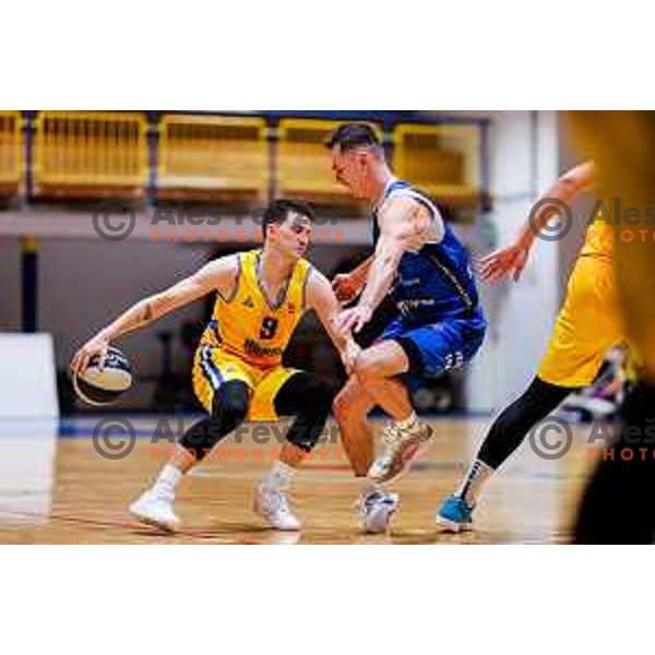 Nejc Baric and Jure Span in action during OTP Bank League 2025/2026 basketball match between Hopsi Polzela and Sentjur in Polzela, Slovenia on October 4, 2025 
